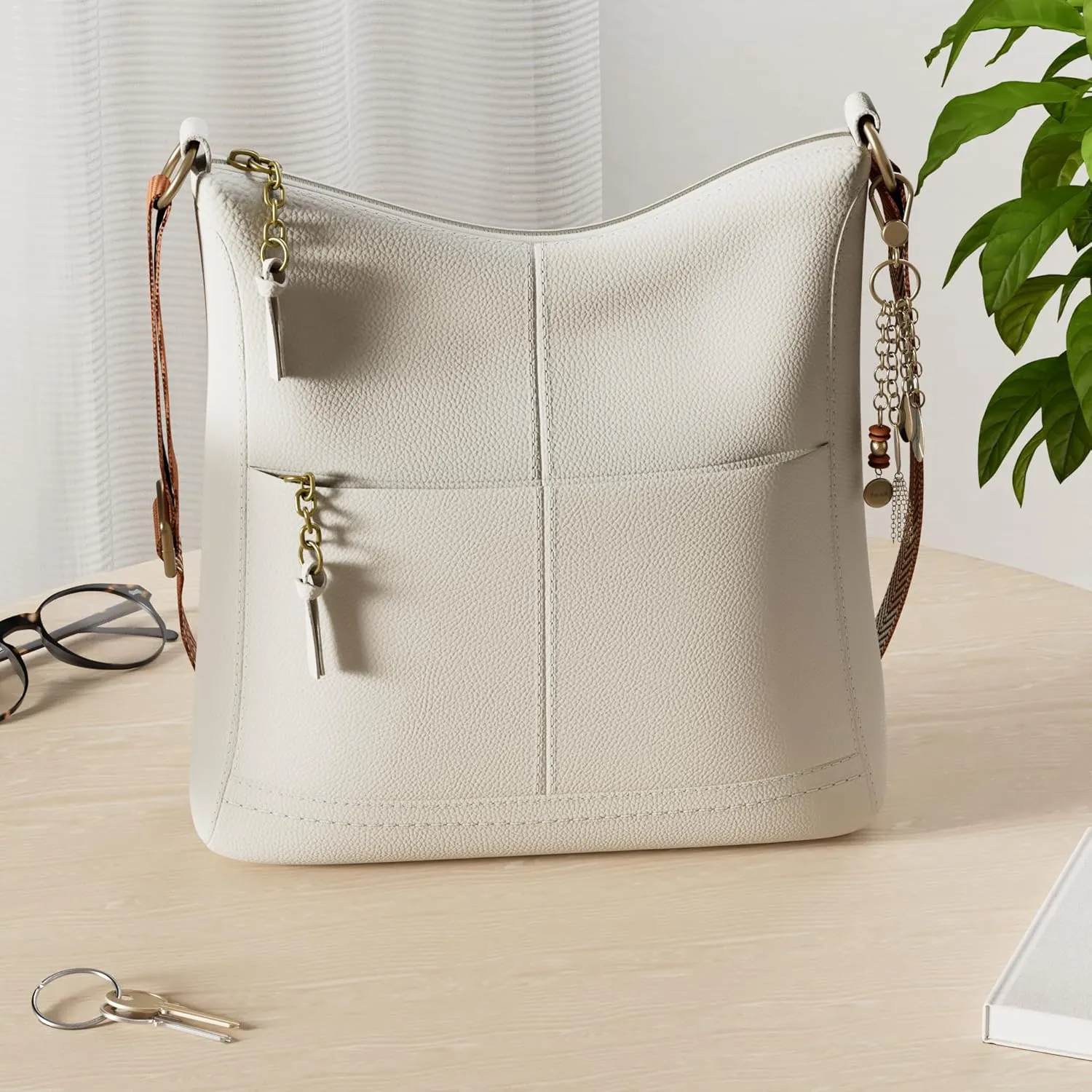 The Sak Lucia Crossbody Bag in Leather, Convertible Purse with Adjustable Strap